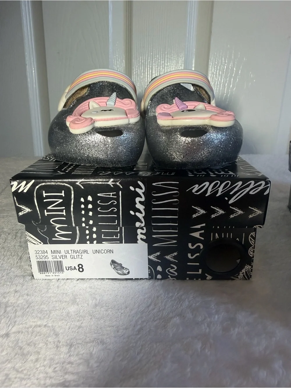 Mini Melissa Silver Glitter Mary Janes with Pink Unicorn Appliqués